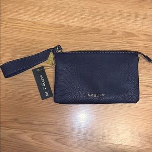 Olivia and Joy purple wristlet
